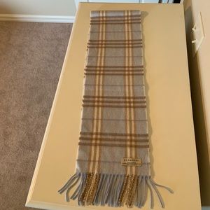 Burberry scarf. Measures 51”x 8”